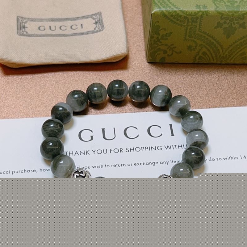 G*u*i bracelets